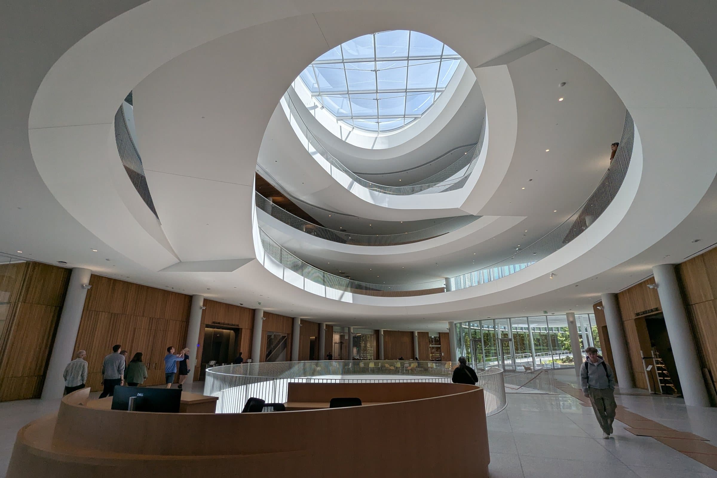 The atrium of the Bakar Gateway building at UC Berkeley, with spiralling balconies rising toward an oval skylight